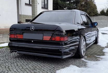 W124 SEDAN KAMEI STYLE REAR ADD-ON WITH EXHAUST OPENING